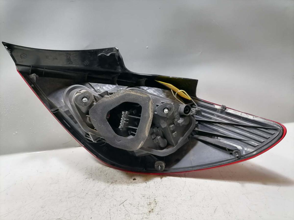 Opel Corsa D original R&uuml;cklicht R&uuml;ckleuchte Schlussleuchte links 5-T&uuml;rer Bj.2010